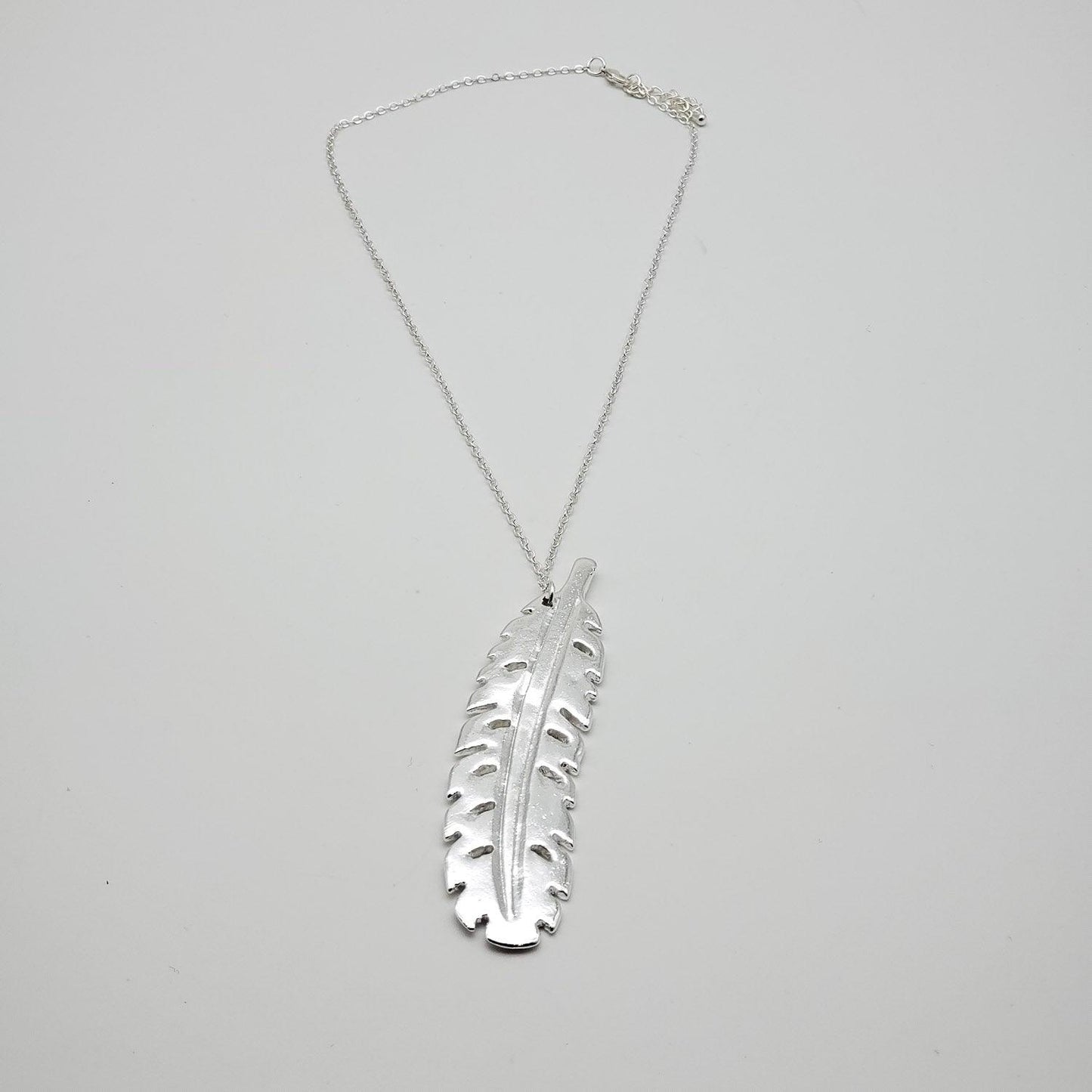 Colgante Pluma Plateada