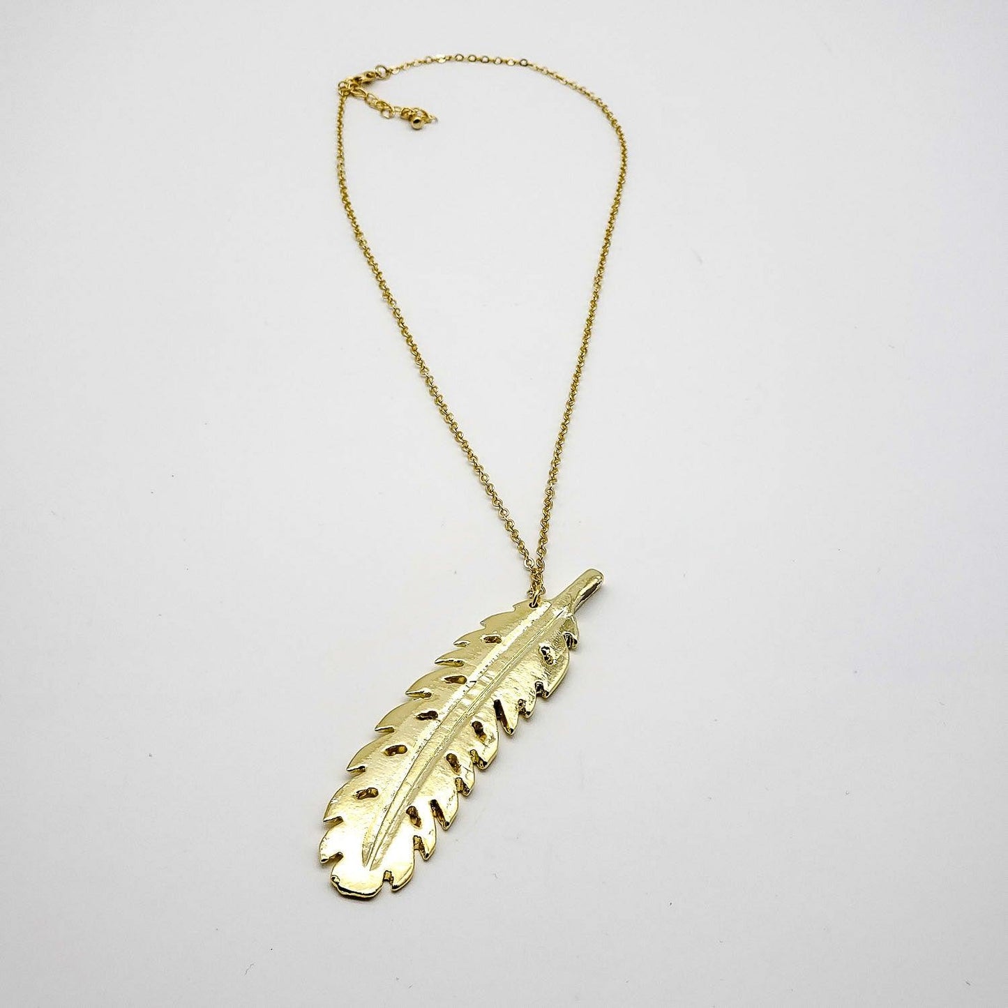 Colgante Pluma Dorada